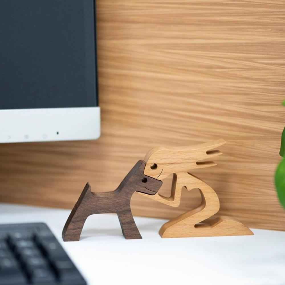 house & garden : Wooden sculpture of person with dog, minimalist home decoration in van Vandaliamo