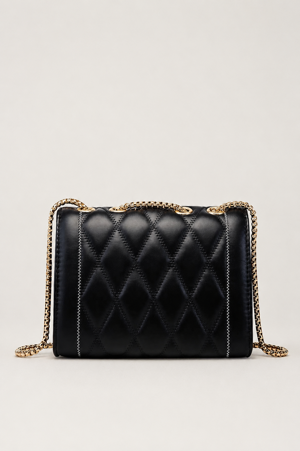 Elegant Heart-Lock Crossbody Bag – Compact Silhouette with Lustrous Strap