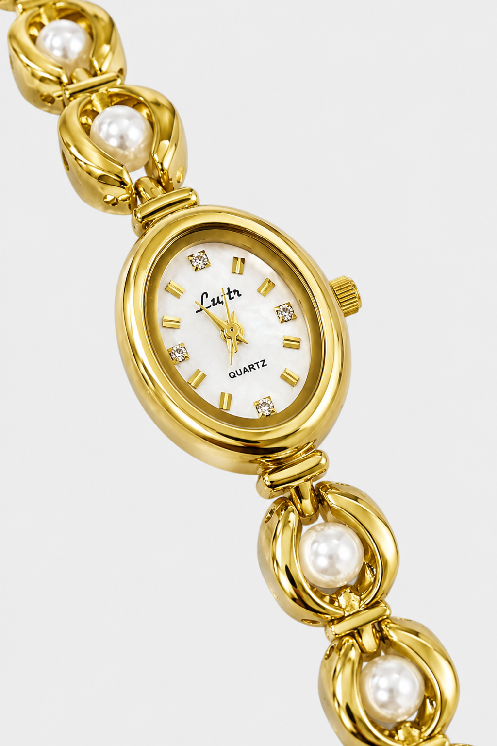Refined Oval Watch – Polished Links with Lustrous Spherical Accents