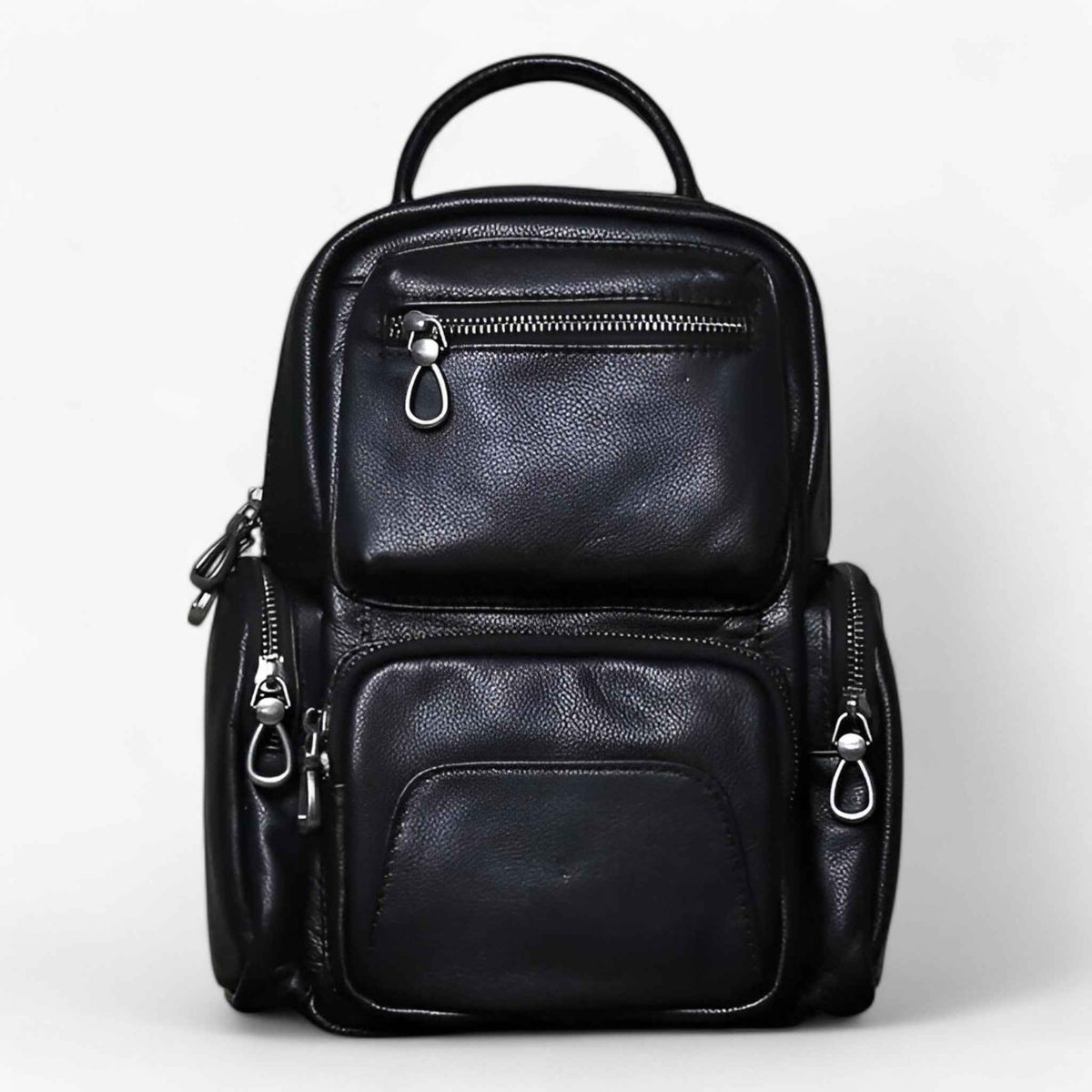 Bags : Men's Two-in-One Leather Chest Bag and Backpack in van Roselva
