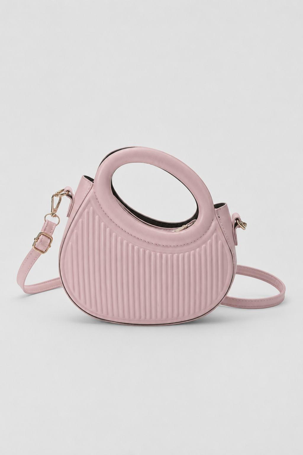 Sculptural Crescent Handbag – Pleated Textured Body with Integrated Circular Handle