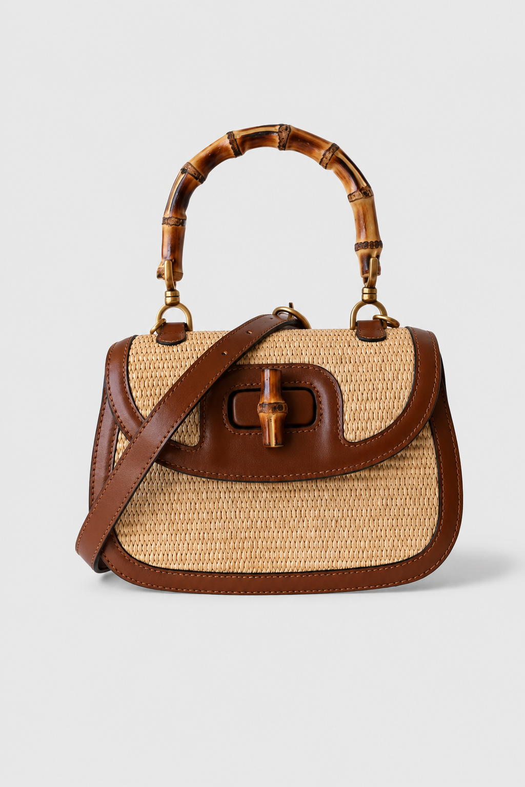 Woven-Style Handbag – Structured Saddle Silhouette with Segmented Rigid Handle