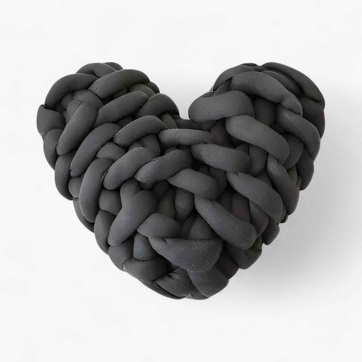Hjertepude | Hjerteformet pudemot i groft strik til et hyggeligt hjem - €25 : Heart-shaped pillow motif in coarse knit for a cozy home in Grey van Vandaliamo
