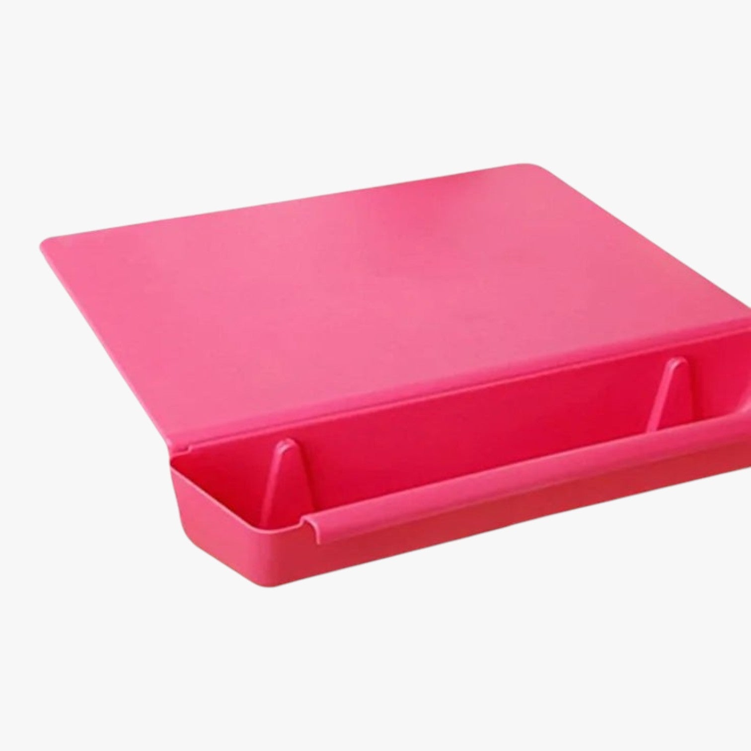 Roselva pink BPA-free plastic cutting board with an integrated removable food collection tray for kitchen prep