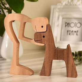 house & garden : Wooden sculpture of person with dog, minimalist home decoration in Man with dog van Vandaliamo