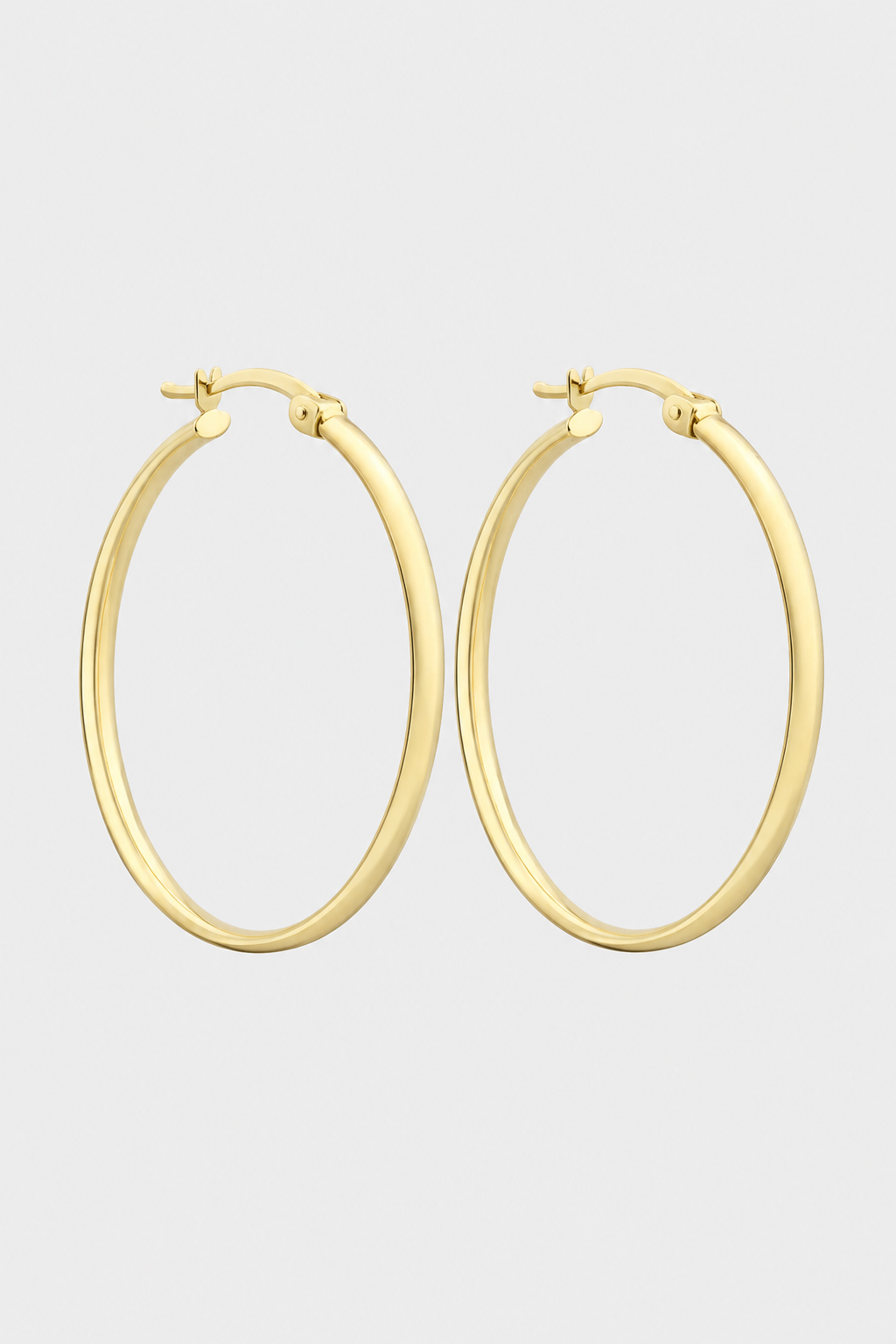 Classic Oval Hoop Earrings – Refined Polish & Face-Framing Elegance