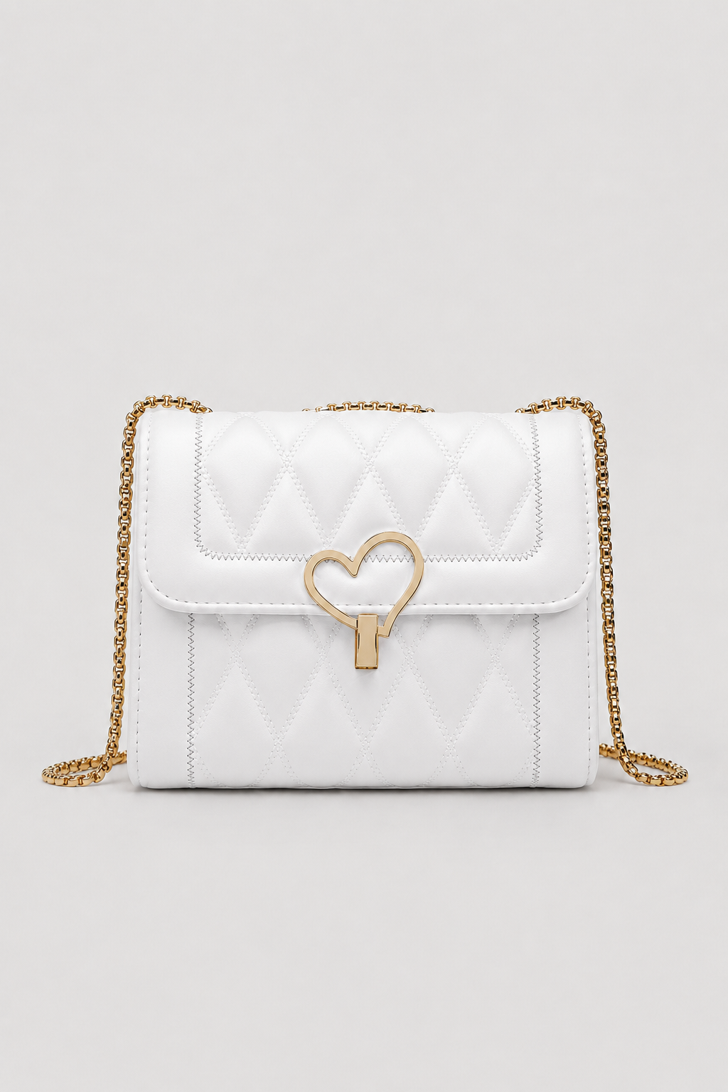 Elegant Heart-Lock Crossbody Bag – Compact Silhouette with Lustrous Strap