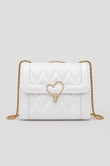 Elegant Heart-Lock Crossbody Bag – Compact Silhouette with Lustrous Strap
