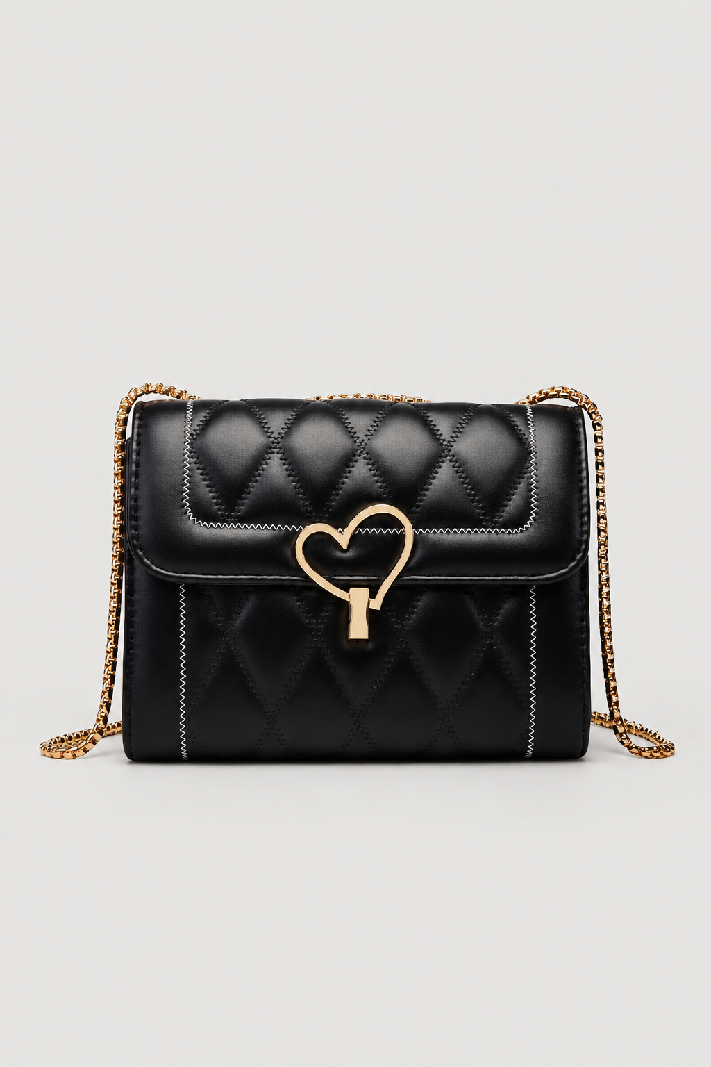 Elegant Heart-Lock Crossbody Bag – Compact Silhouette with Lustrous Strap
