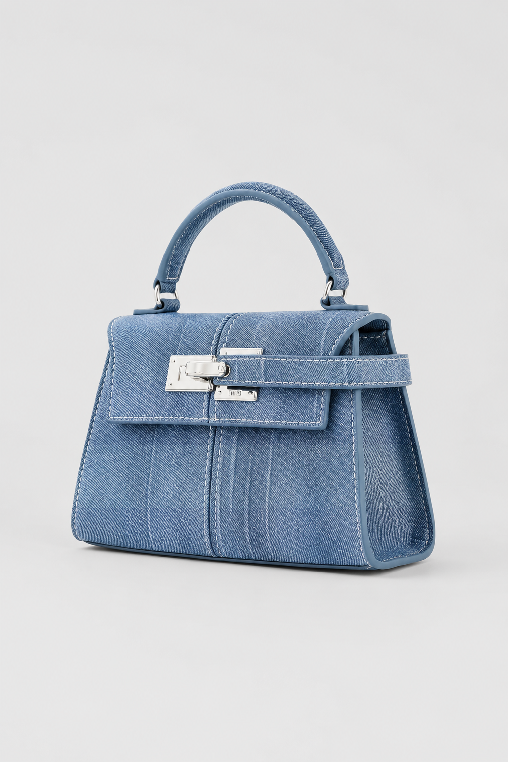 Elegant Mini Handbag – Structured Silhouette with High-Contrast Stitching