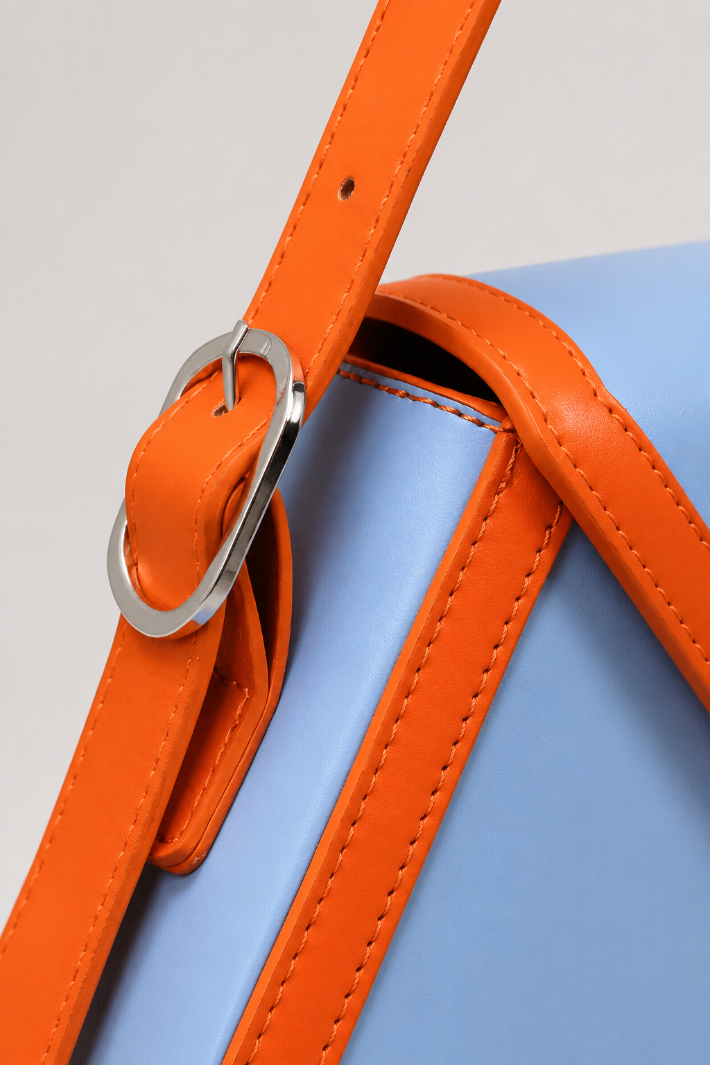 Geometric Triangular Mini Bag – Sleek Matte Silhouette with Adjustable Buckled Strap