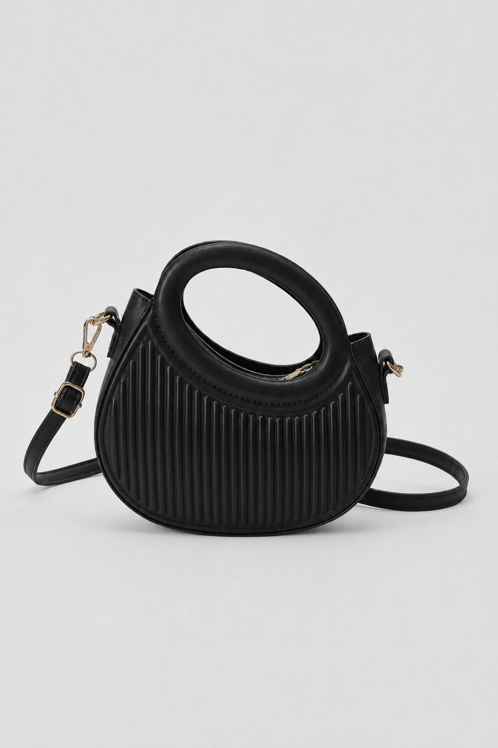 Sculptural Crescent Handbag – Pleated Textured Body with Integrated Circular Handle