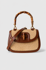 Woven-Style Handbag – Structured Saddle Silhouette with Segmented Rigid Handle