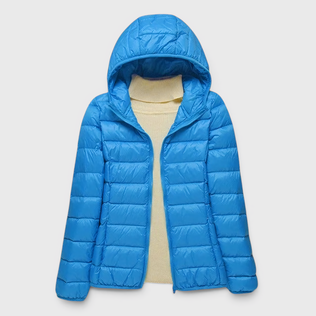 Fashion : Women's Quilted Puffer Jacket with Hood in Light Blue van Vanda Liamo